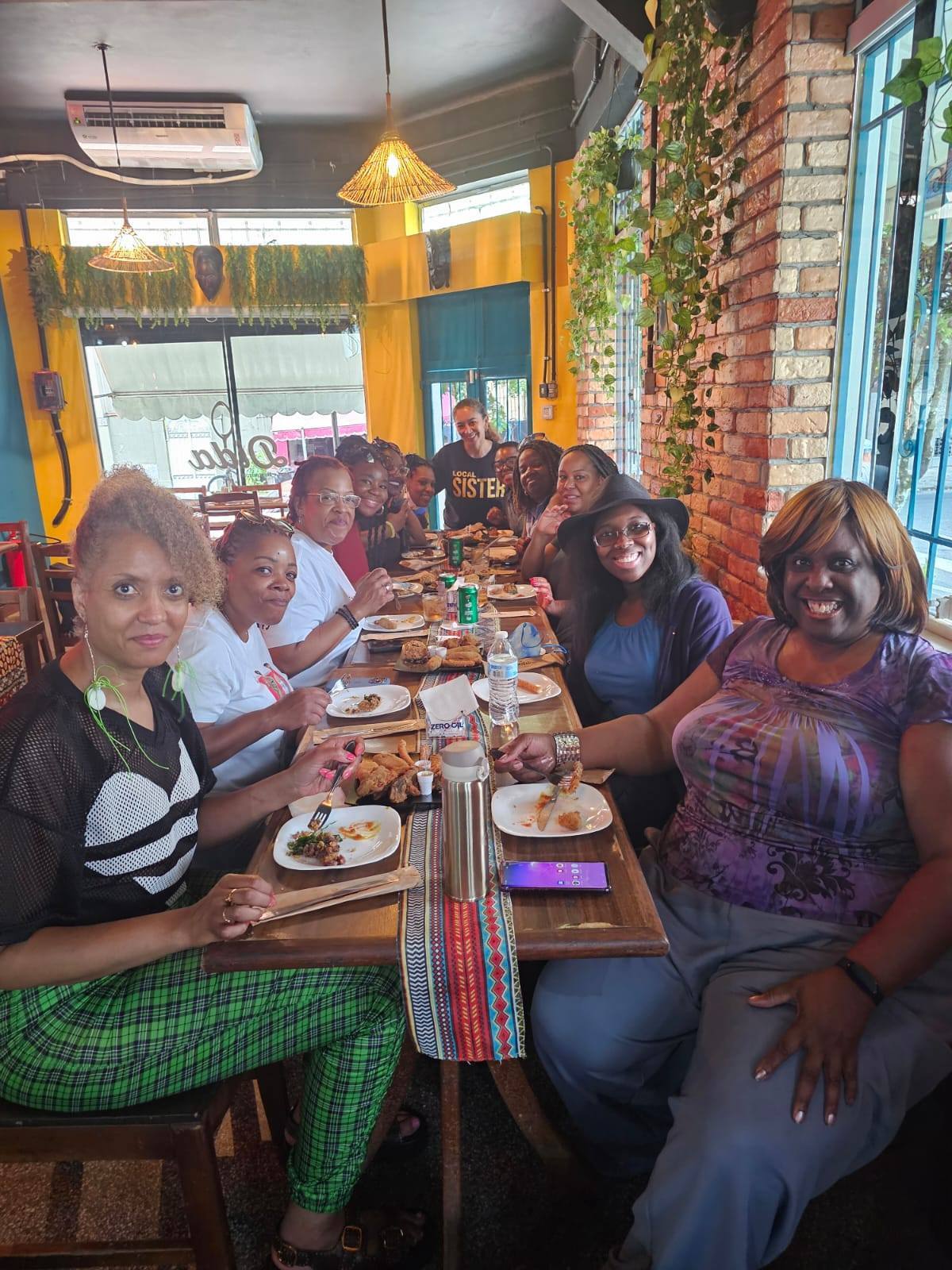 group of women sitting at a dinner table